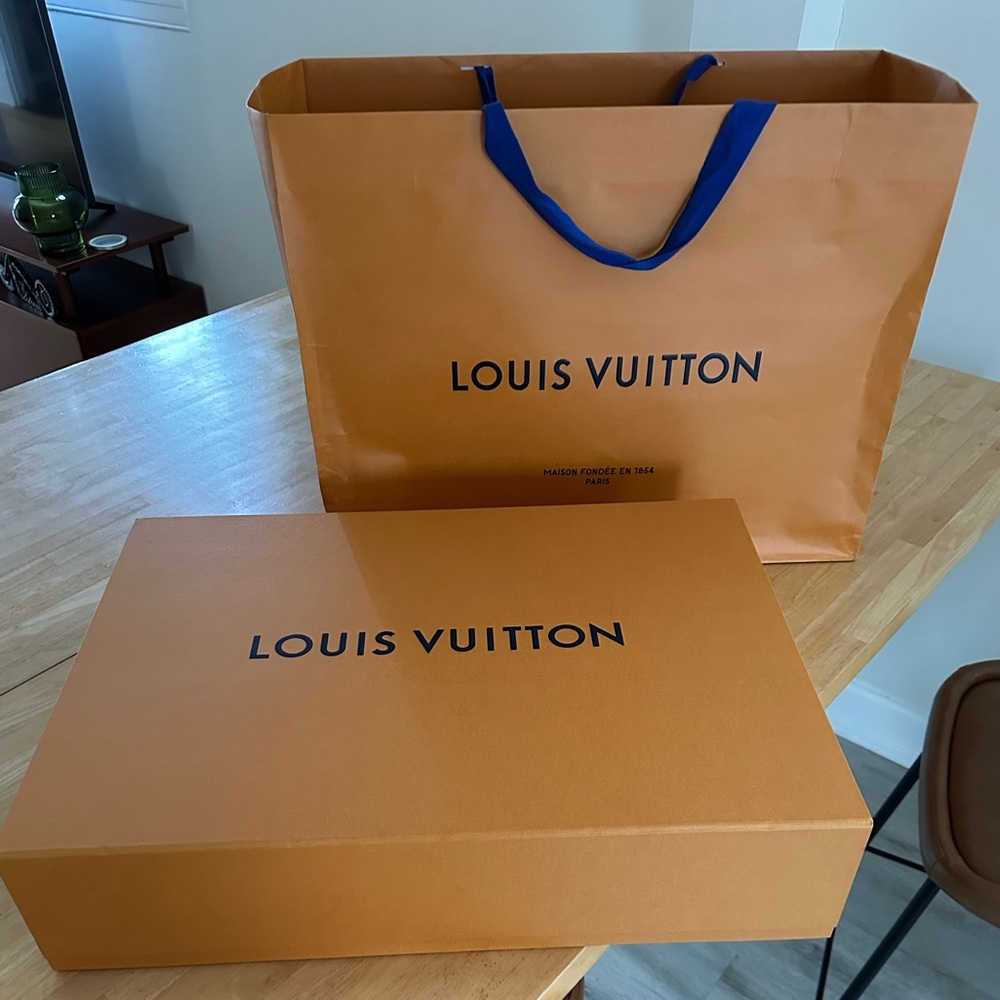 Extra large Louis Vuitton duffel bag box with ribbon.